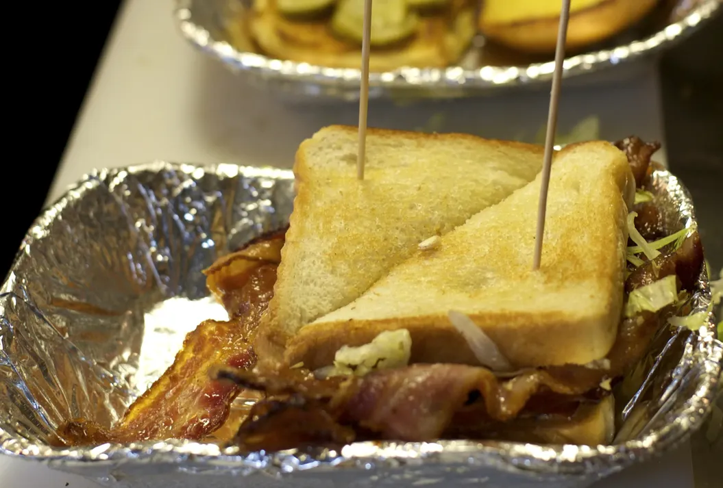 Toasted club sandwich with bacon